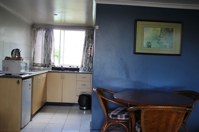 Imagen de la habitación del Hotel Capricorn International. Foto 2