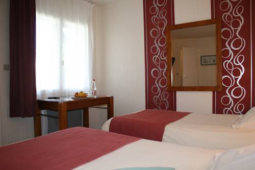 Imagen de la habitación del Hotel Capricorne. Foto 6