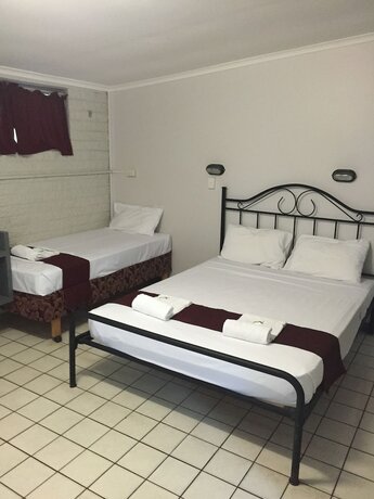 Imagen de la habitación del Hotel Capricornia Motel. Foto 17