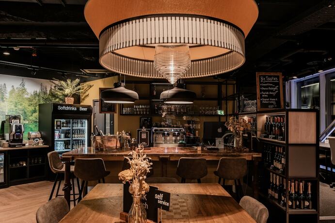 Imagen del bar/restaurante del Hotel Capsule - Alpine Garden Zurich Airport. Foto 11