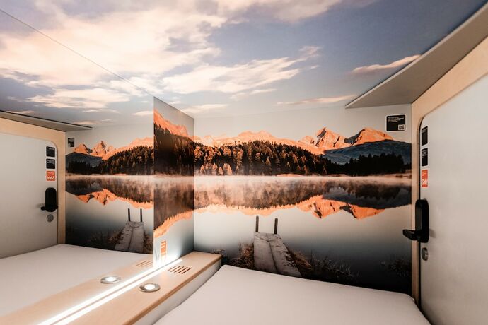 Imagen de la habitación del Hotel Capsule - Alpine Garden Zurich Airport. Foto 13