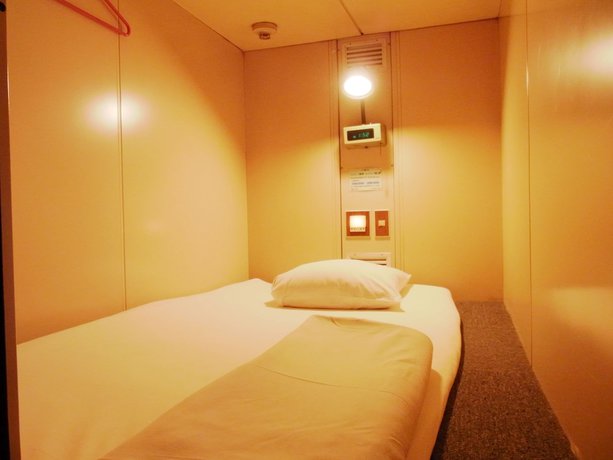 Imagen de la habitación del Hotel Capsule Block Room. Foto 14