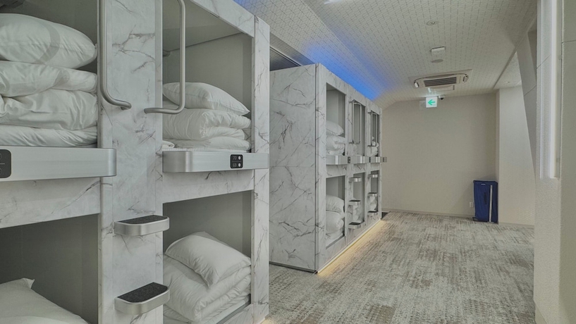 Imagen de la habitación del Hotel Capsule Hostel Beppu Tower. Foto 9