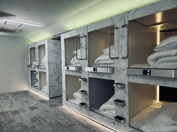 Imagen de la habitación del Hotel Capsule Hostel Beppu Tower. Foto 12