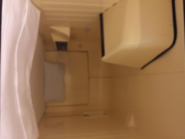 Imagen de la habitación del Hotel Capsule Inn Hamamatsucho. Foto 2