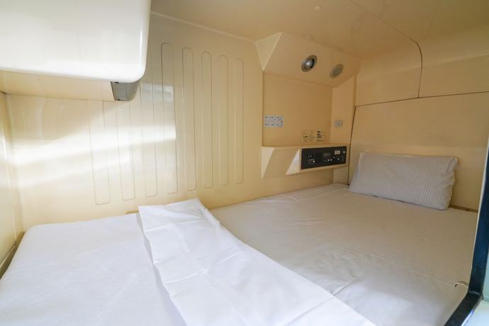 Imagen de la habitación del Hotel Capsule Inn Hamamatsucho. Foto 3