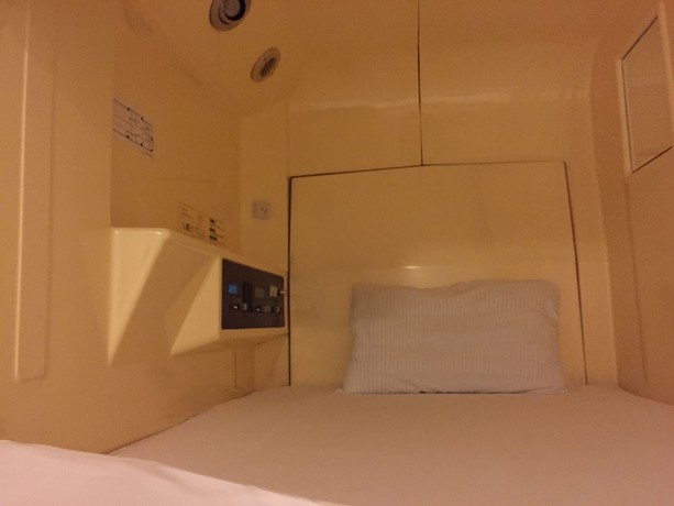 Imagen de la habitación del Hotel Capsule Inn Hamamatsucho. Foto 4