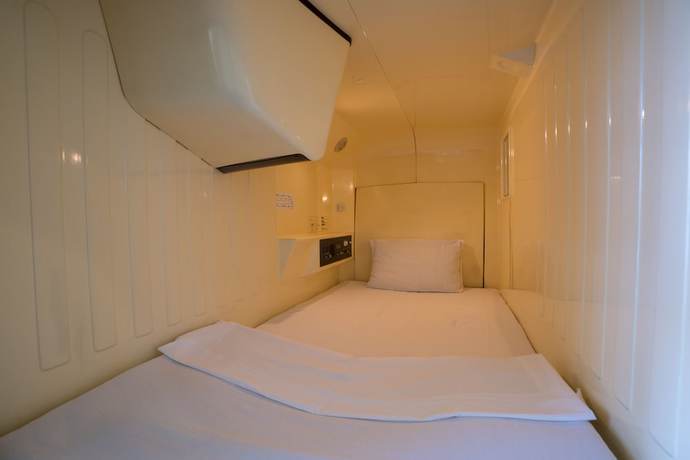 Imagen de la habitación del Hotel Capsule Inn Hamamatsucho. Foto 5