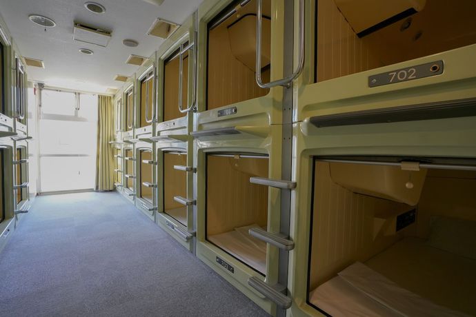 Imagen de la habitación del Hotel Capsule Inn Hamamatsucho. Foto 7