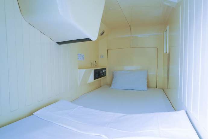 Imagen de la habitación del Hotel Capsule Inn Hamamatsucho. Foto 8