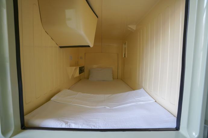 Imagen de la habitación del Hotel Capsule Inn Hamamatsucho. Foto 11