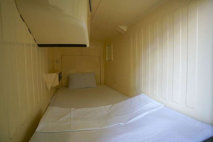 Imagen de la habitación del Hotel Capsule Inn Hamamatsucho. Foto 12