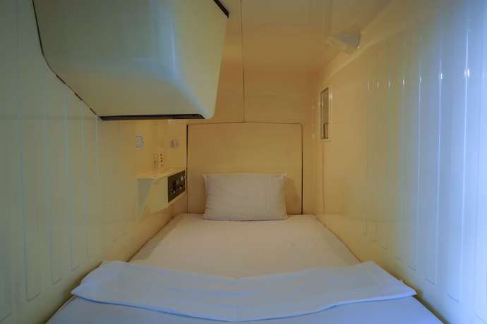 Imagen de la habitación del Hotel Capsule Inn Hamamatsucho. Foto 15