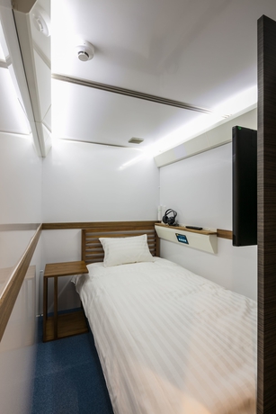 Imagen de la habitación del Hotel Capsule Resort Kyoto Square. Foto 10
