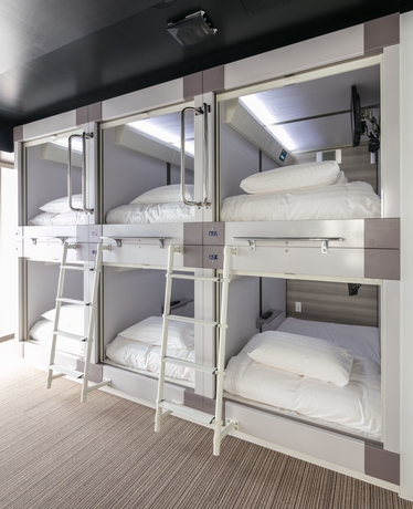 Imagen de la habitación del Hotel Capsule Resort Kyoto Square. Foto 14