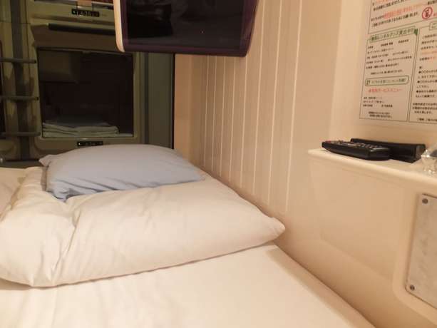 Imagen de la habitación del Hotel Capsule Wellbe Sakae - Caters To Men. Foto 12