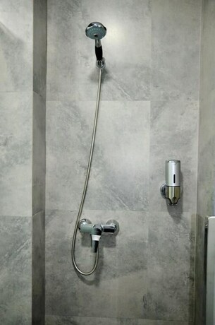 Imagen de la habitación del Hotel Capsule Zodiak. Foto 21