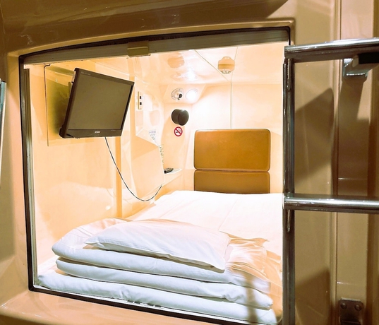Imagen de la habitación del Hotel Capsule and Spa Grand Sauna Shinsaibashi. Foto 11