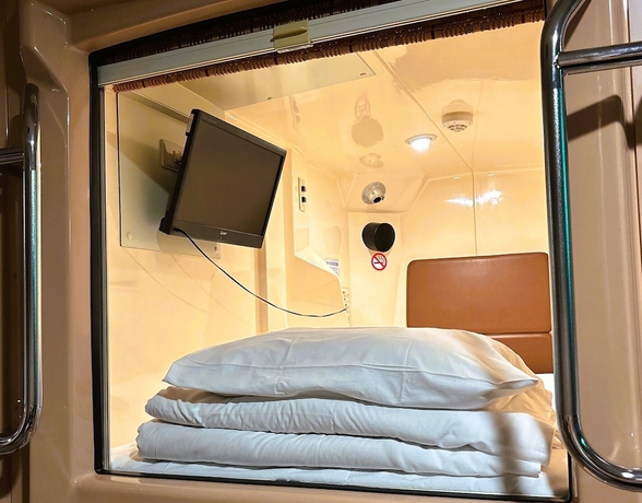 Imagen de la habitación del Hotel Capsule and Spa Grand Sauna Shinsaibashi. Foto 13