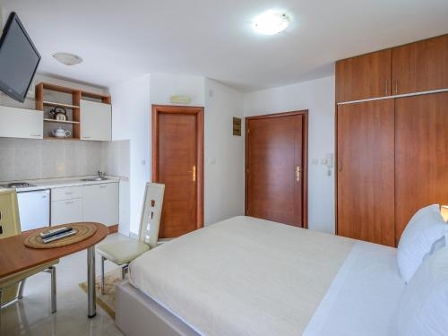 Imagen de la habitación del Hotel Captain Apartments. Foto 6