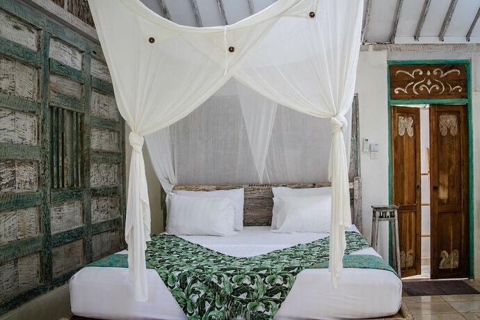 Imagen de la habitación del Hotel Captain Coconuts Gili Air. Foto 17