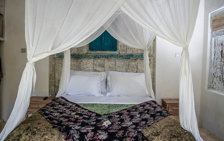 Imagen de la habitación del Hotel Captain Coconuts Gili Air. Foto 18