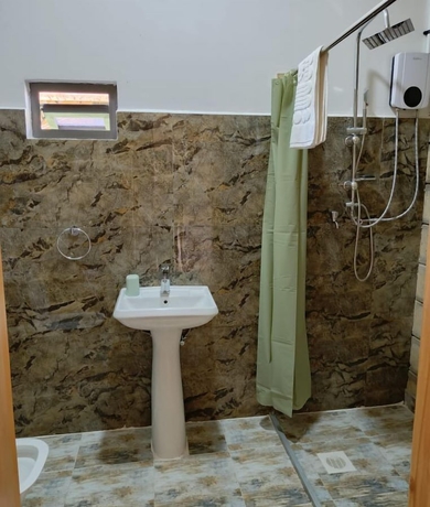 Imagen de la habitación del Hotel Captain James Camp. Foto 13