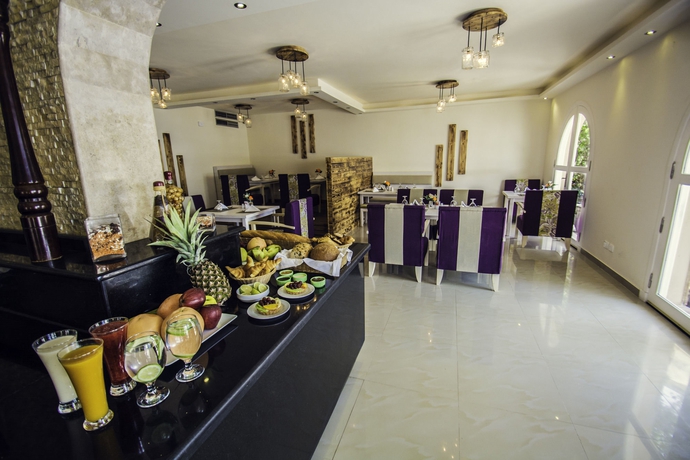 Imagen del bar/restaurante del Hotel Captain's Inn. Foto 6