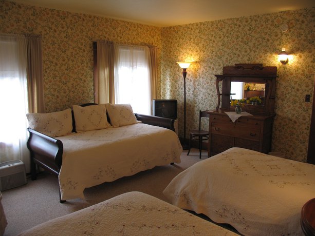 Imagen de la habitación del Hotel Captains Quarters. Foto 17