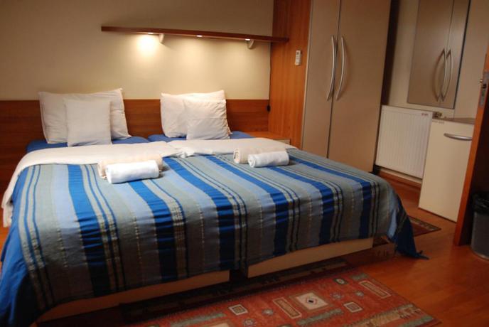 Imagen de la habitación del Hotel Car Royal Apartmans. Foto 5