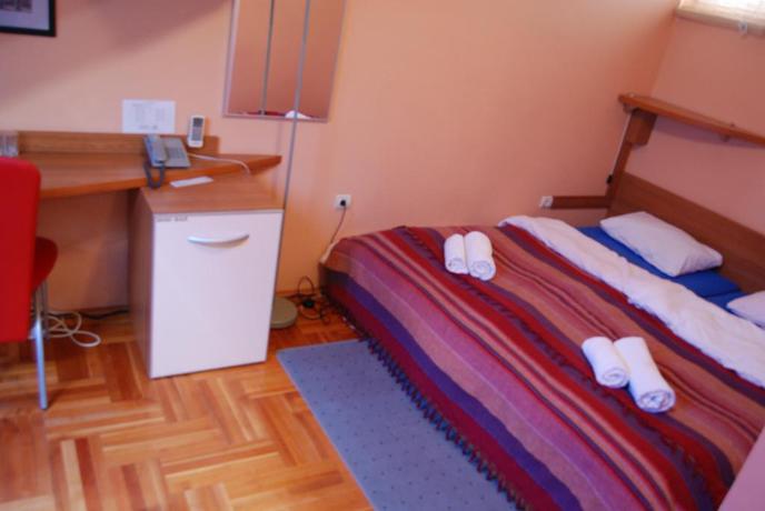 Imagen de la habitación del Hotel Car Royal Apartmans. Foto 6