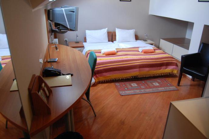Imagen de la habitación del Hotel Car Royal Apartmans. Foto 10
