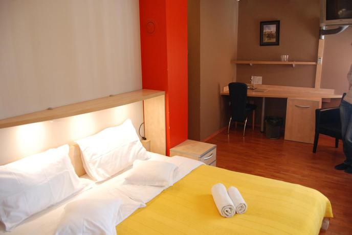 Imagen de la habitación del Hotel Car Royal Apartmans. Foto 12