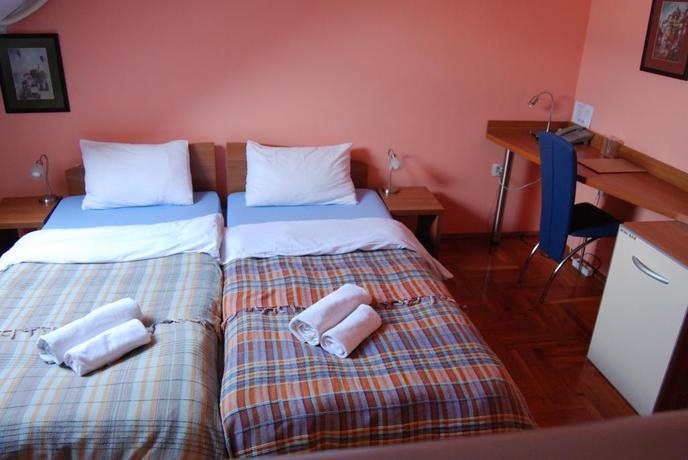 Imagen de la habitación del Hotel Car Royal Apartmans. Foto 15