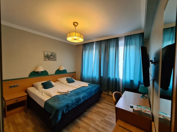 Imagen de la habitación del Hotel Cara Vita. Foto 16