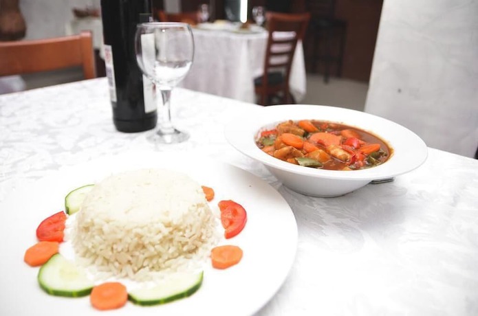 Imagen del bar/restaurante del Hotel Carabana and Suites. Foto 2