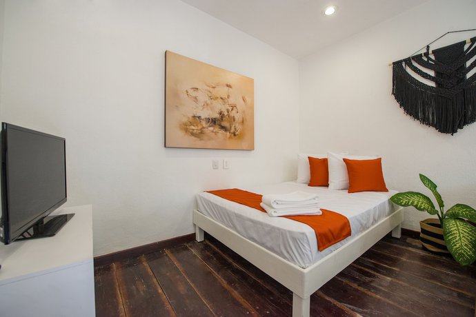 Imagen de la habitación del Hotel Caracol Puerto Morelos. Foto 2