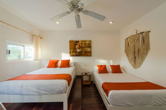 Imagen de la habitación del Hotel Caracol Puerto Morelos. Foto 6