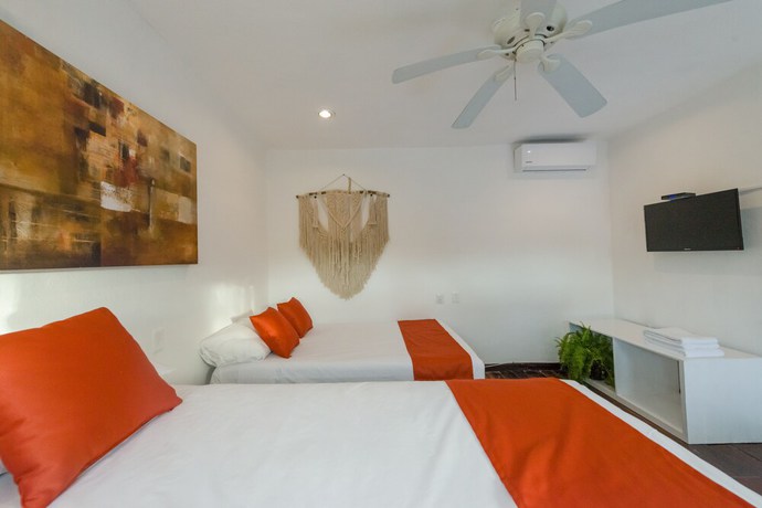 Imagen de la habitación del Hotel Caracol Puerto Morelos. Foto 10