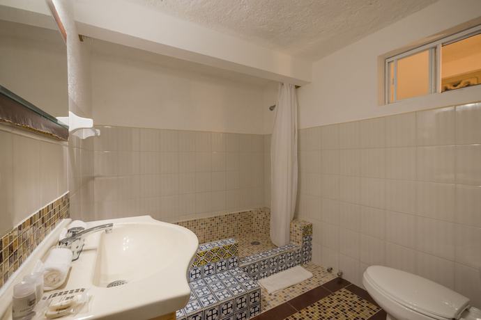 Imagen de la habitación del Hotel Caracol Puerto Morelos. Foto 11
