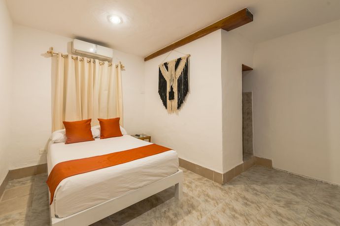 Imagen de la habitación del Hotel Caracol Puerto Morelos. Foto 15