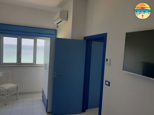 Imagen de la habitación del Hotel Caraibisiaco sul Mare. Foto 3