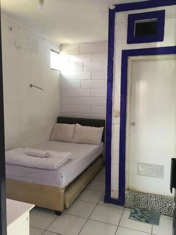 Imagen de la habitación del Hotel Caraka Batununggal. Foto 17