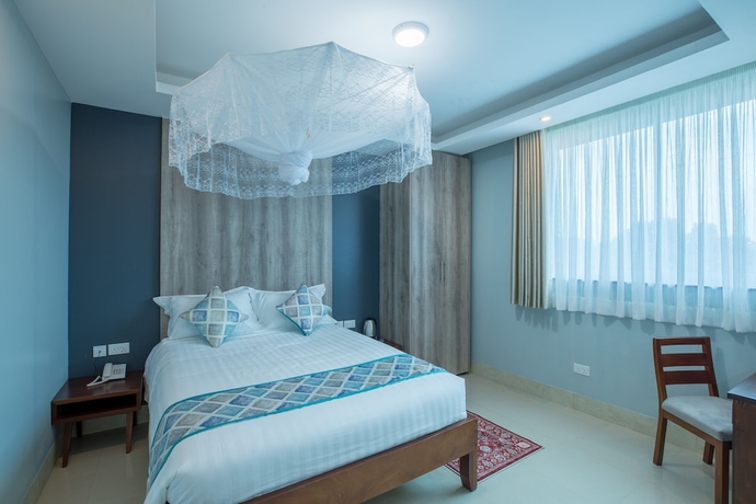 Imagen de la habitación del Hotel Caran Kisugu. Foto 4