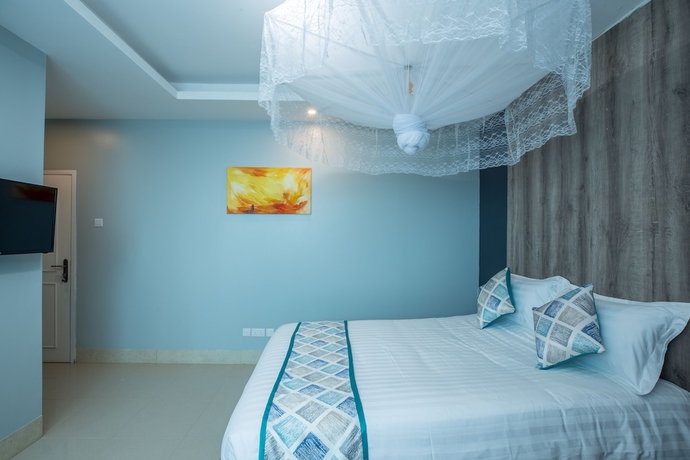 Imagen de la habitación del Hotel Caran Kisugu. Foto 5
