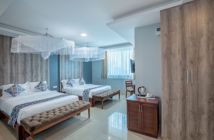 Imagen de la habitación del Hotel Caran Kisugu. Foto 6