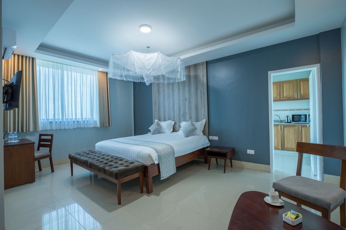 Imagen de la habitación del Hotel Caran Kisugu. Foto 7