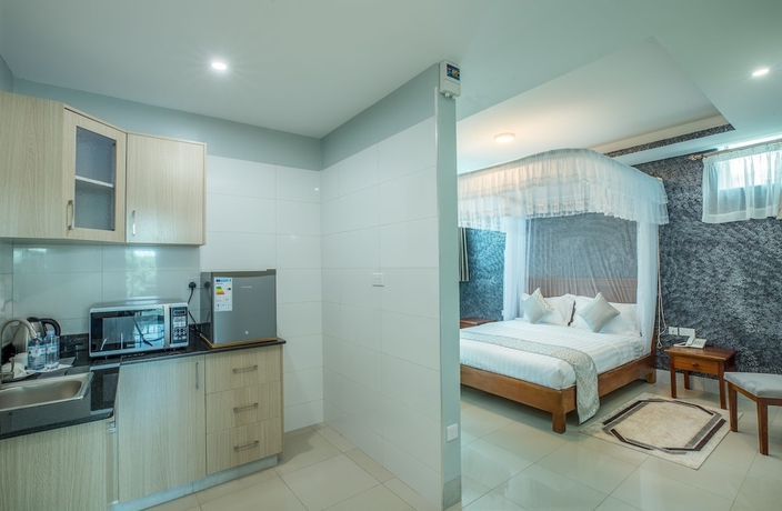 Imagen de la habitación del Hotel Caran Kisugu. Foto 8