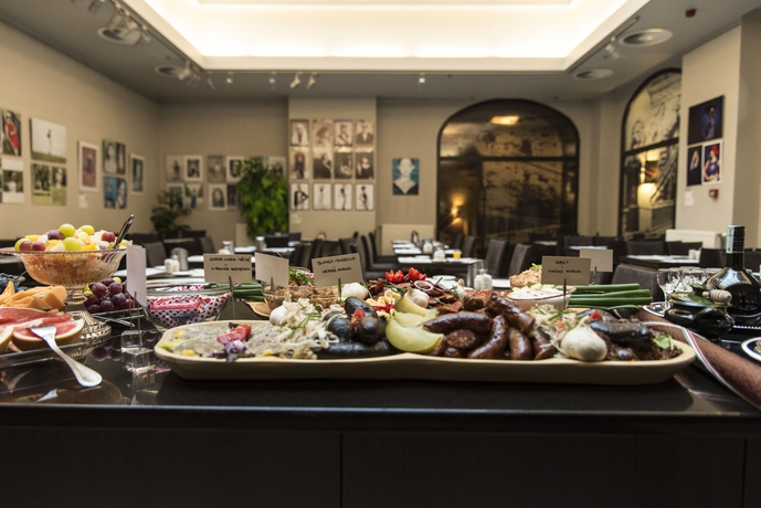 Imagen del bar/restaurante del Hotel Carat Boutique. Foto 3