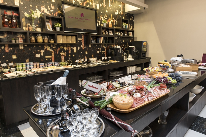 Imagen del bar/restaurante del Hotel Carat Boutique. Foto 5